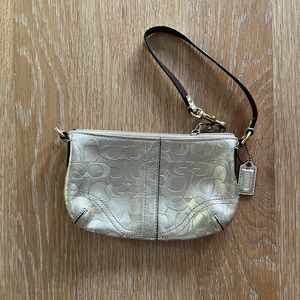 Coach wristlet - gold